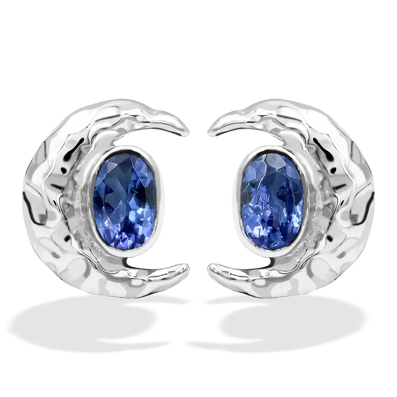 Tanzanite 6mm oval faceted post style ring with hammered crescent moon accent.