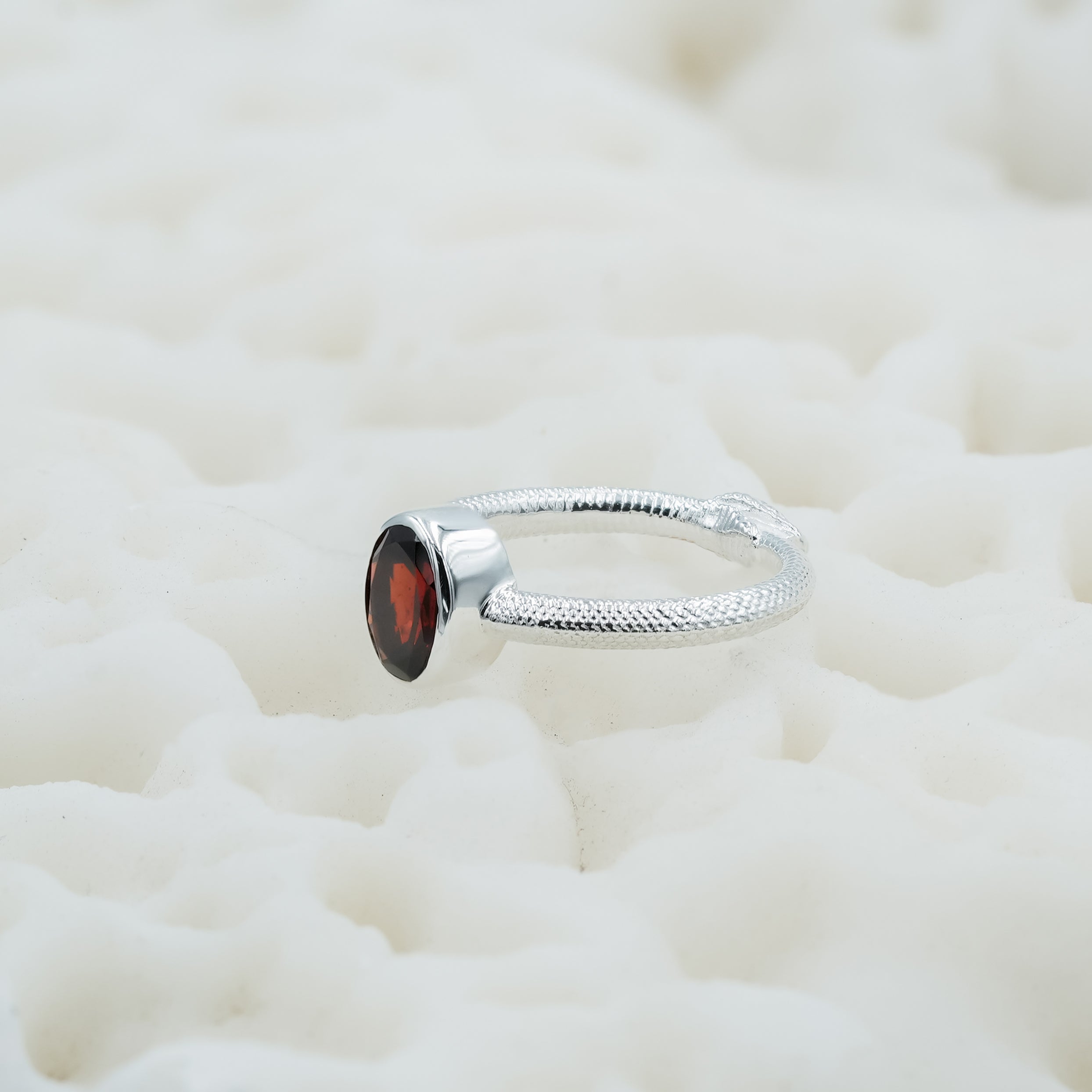 Starborn Garnet Ouroboros Faceted Oval Ring in Fine Sterling Silver