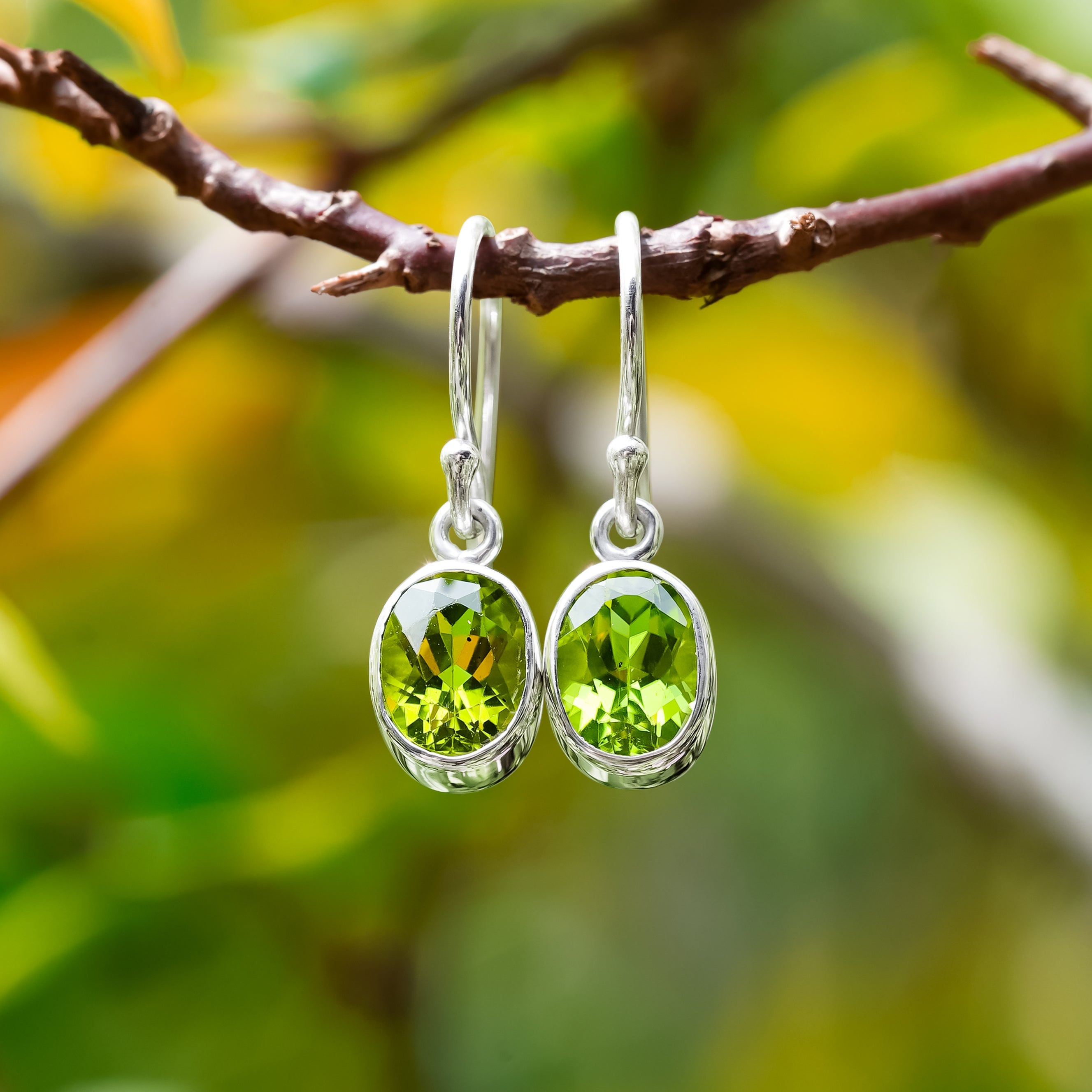 Starborn Peridot Oval Faceted Dangle Earrings in Sterling Silver