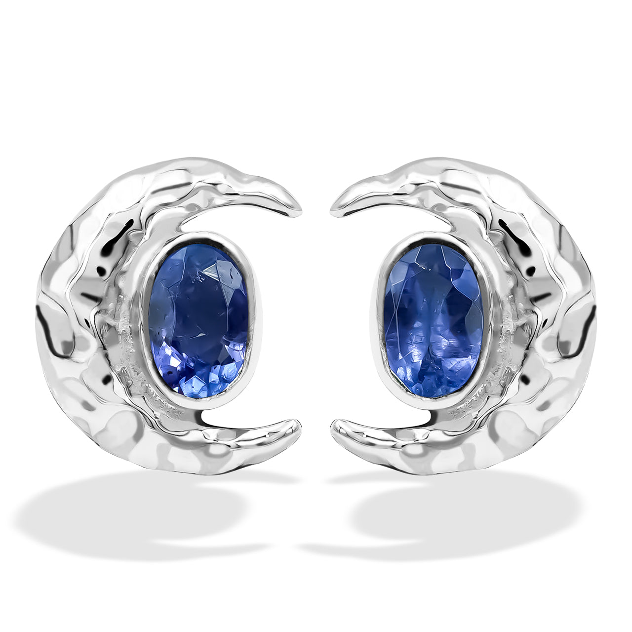 Tanzanite 6mm oval faceted post style ring with hammered crescent moon accent.