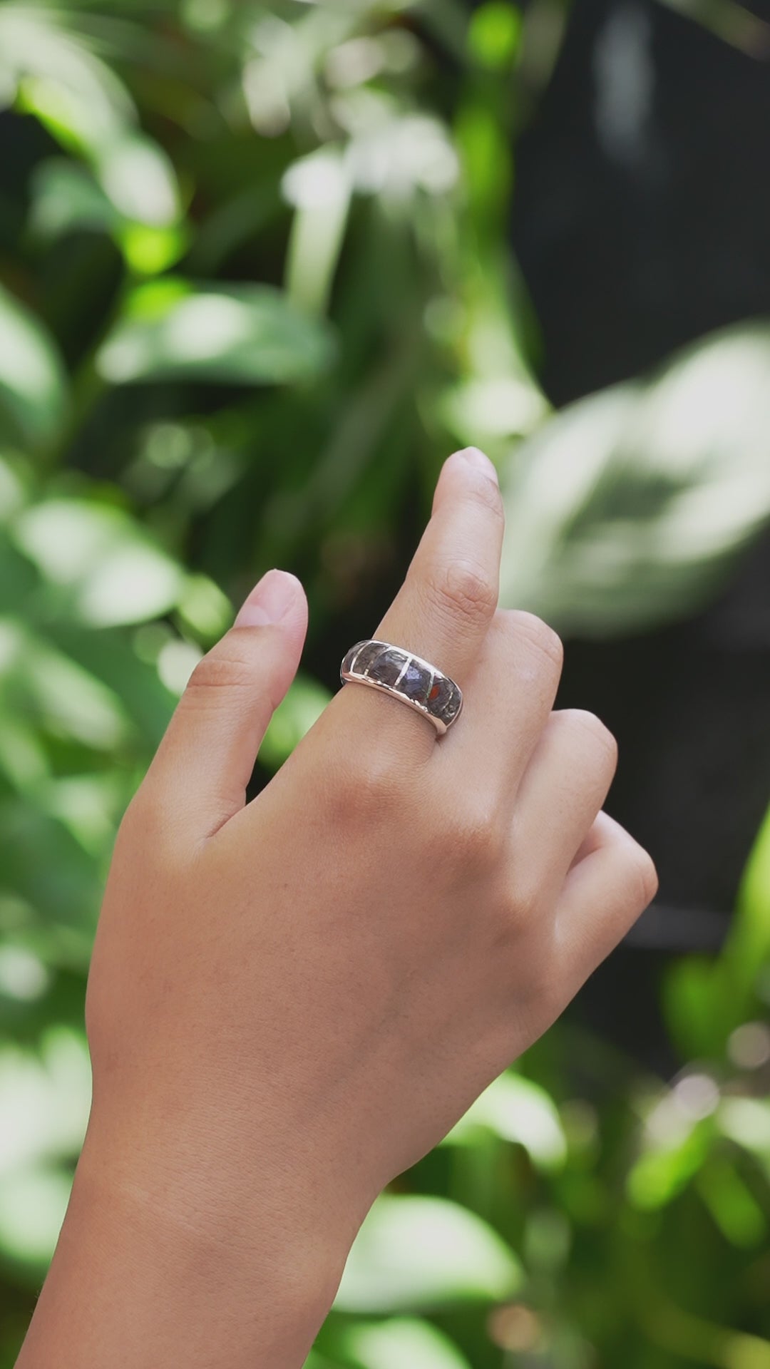 Video showing Fossil Dinosaur Bone channel ring worn on finger for size reference.